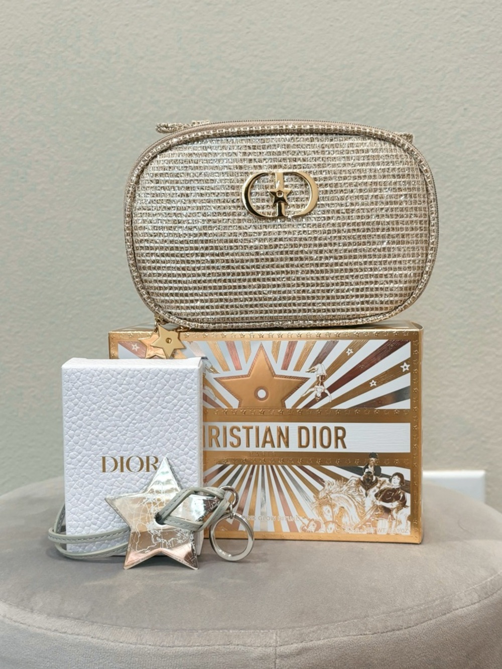 Dior Metallic Gold Cosmetic Pouch and Dior Exclusive Star Keychain Bundle